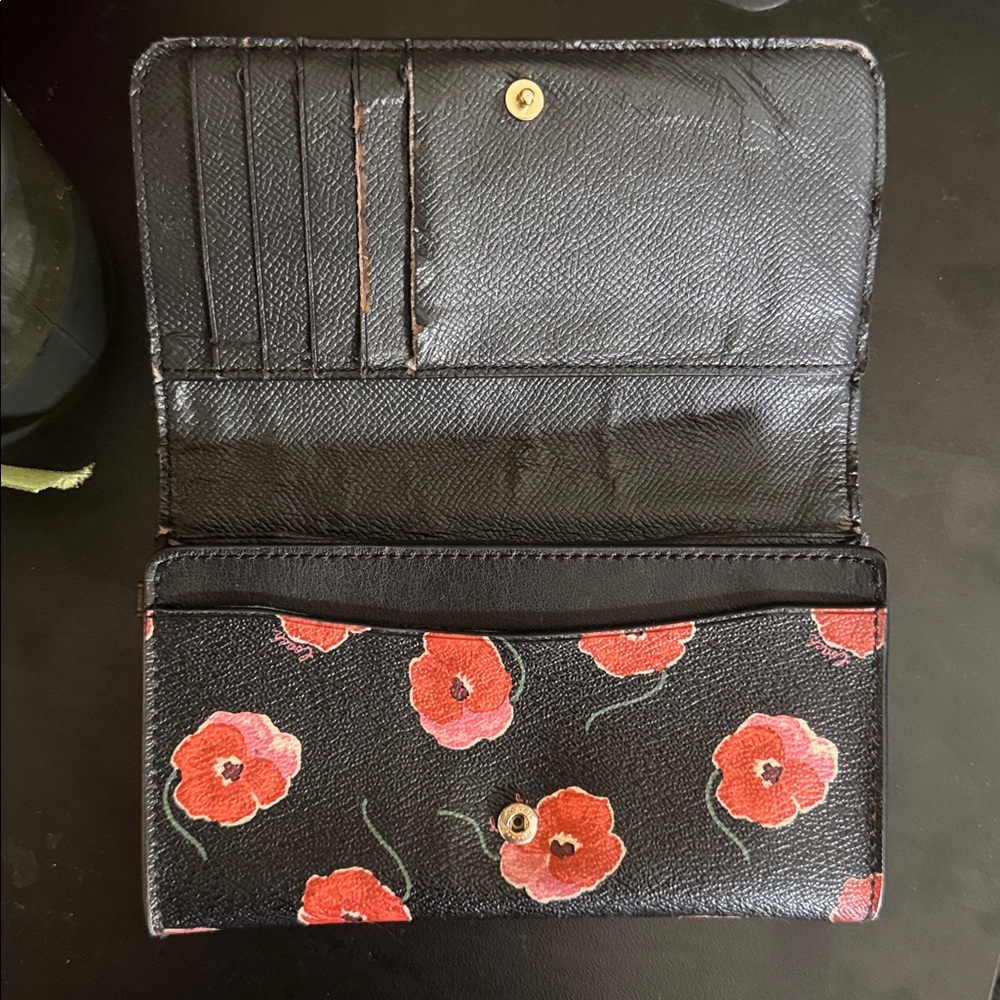 COACH bifold wallet with cute poppy print. Change pocket in back. Snap closure. - Picture 13 of 16